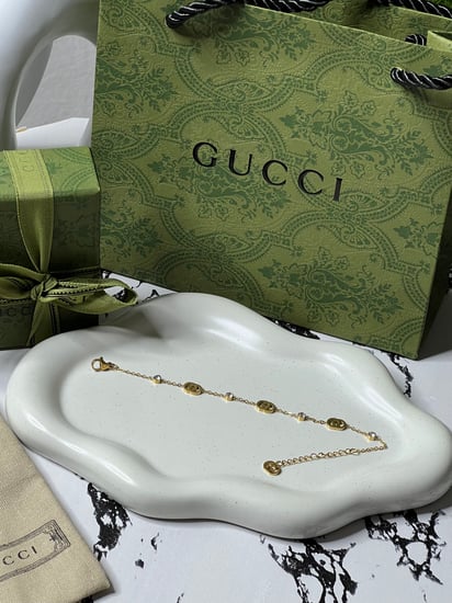 اسوارة GUCCI ذهبي
