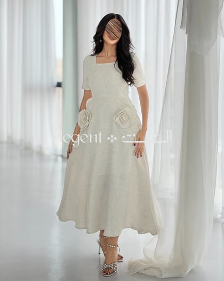 فستان بناتي بتصميم راق وأكمام قصيرة مع جيوب جانبية مخفية وورود ناعمة