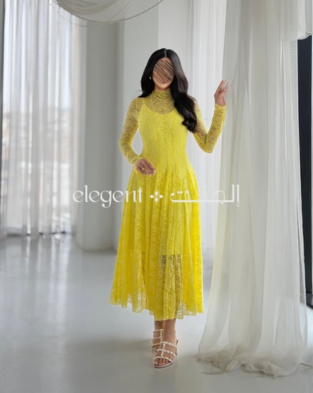 فستان دانتيل أصفر طويل بقصة خصر محددة