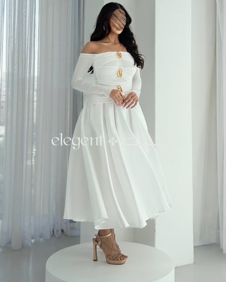 فستان أنيق بقصة جذابة مع تنورة واسعة من خامة ميكادو الفاخرة