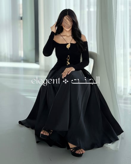 فستان أنيق بقصة جذابة مع تنورة ميكادو تضيف حركة وانسيابية