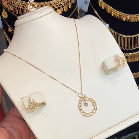 نص طقم عيار 21