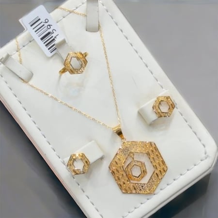 نص طقم عيار 21