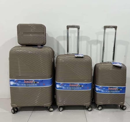 طقم 3حقائب سفر وحقيبه يد