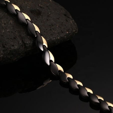 سوار الطاقة الطبي للنساء بحجر الجرمانيوم والمغناطيس لون ذهبي روز بتصميم مستوحى من سوار فسكي