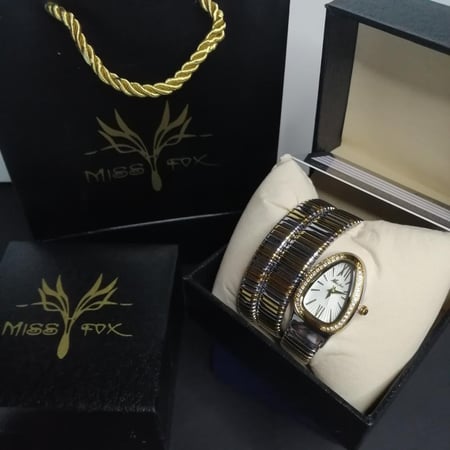ساعة نمط الثعبان  لفتان نسائي