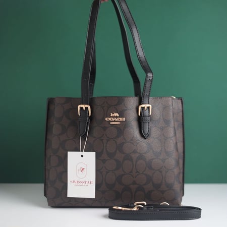 شنطة كوتش تاتوم كاريل 40  CO126