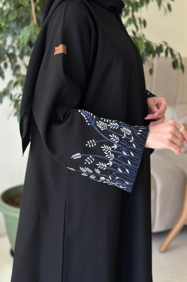 عباية كم