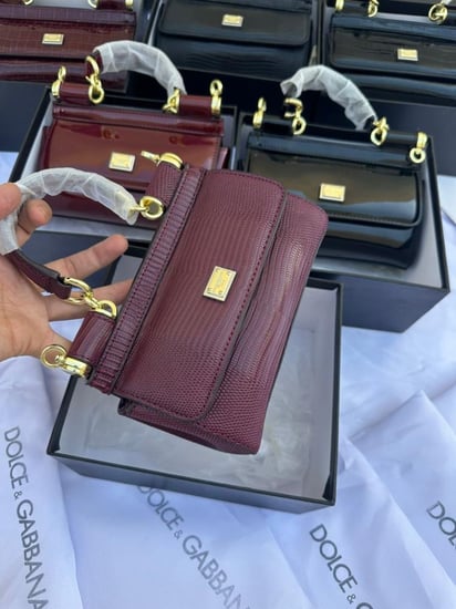 حقيبة دولتشي مزخرف لامع ..