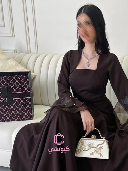 فستان بني راق بأكمام جزار شفافة ومميزة من Cutecci