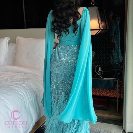 فستان سهرة تركوازي مطرز بريش فاخر