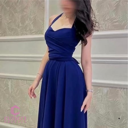 فستان سهرة نيلي علاقي بحزام وتفاصيل تب