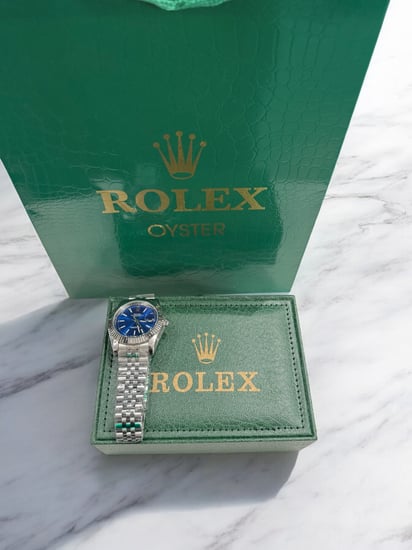 ساعة رولكس مع الملحقات