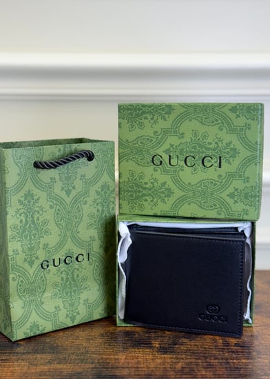 محفظة قوتشي مع الملحقات