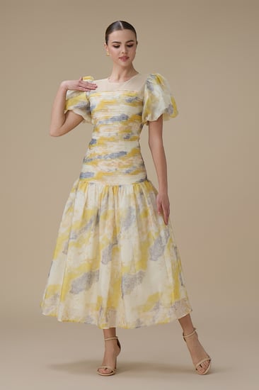 فستان ميدي أصفر أورجانزا بأكمام منفوخة