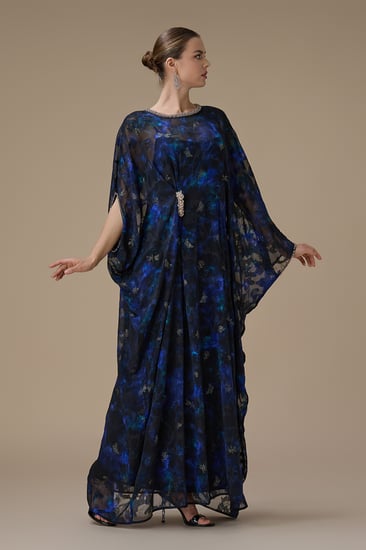 جلابية زرقاء واسعة  بتفاصيل لامعة