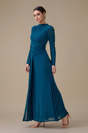 فستان طويل تركواز لامع بكسرات جانبية