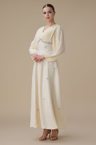 فستان طويل سكري بتفاصيل كريستال