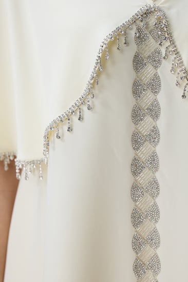 جلابية أنيقة أصفر فاتح بتطريز فضي