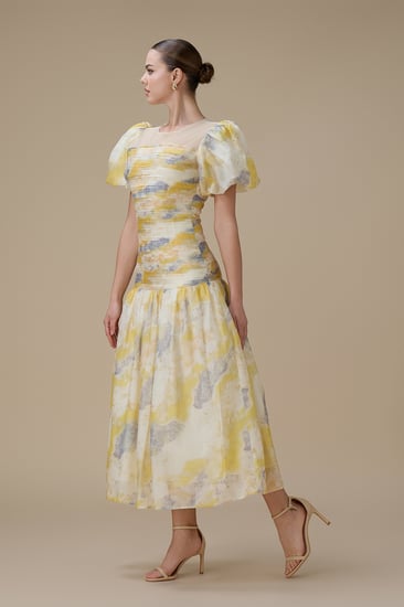 فستان ميدي أصفر أورجانزا بأكمام منفوخة