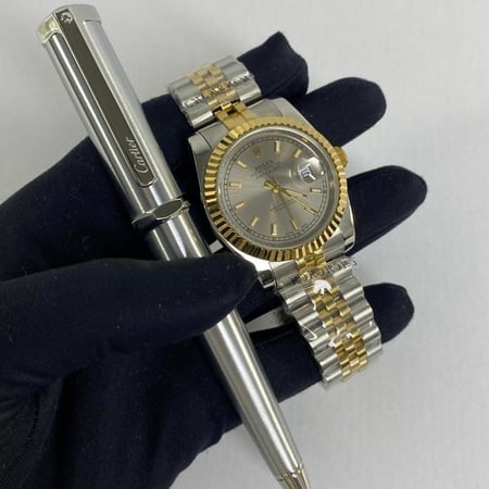 ساعة رولكس و قلم كارتير