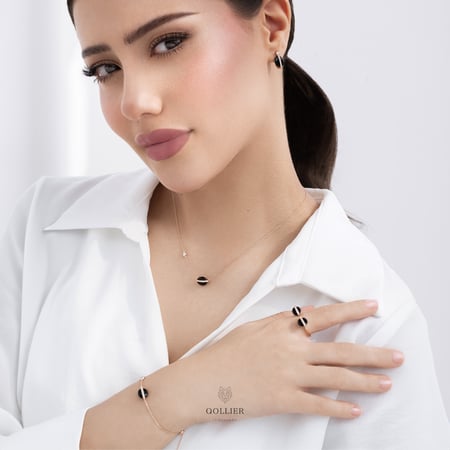 تعليقة بحجر الاونيكس مرصعة بالألماس المدور