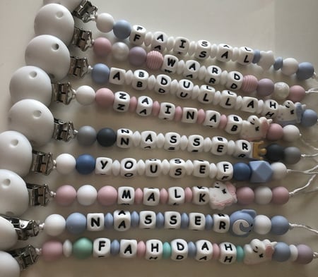 تعليقه مصاصه سلكون بالاسم