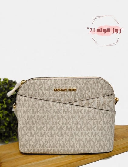 شنطة مايكل كورس اصليه مخفضه اقساط