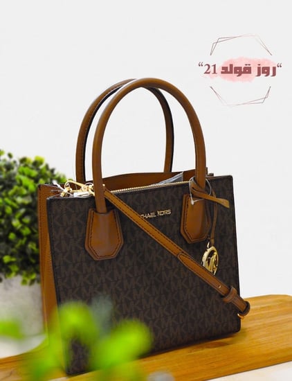 شنطة مايكل كورس اصليه مخفضه اقساط