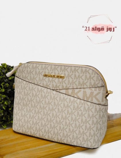 شنطة مايكل كورس اصليه مخفضه اقساط