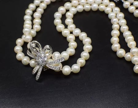 عقد اللولو من طبقتين ووردة الزركون