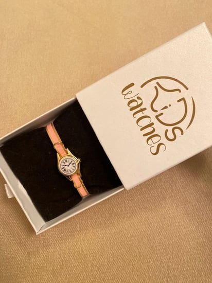 شكل ساعة جلد مواليد زينة