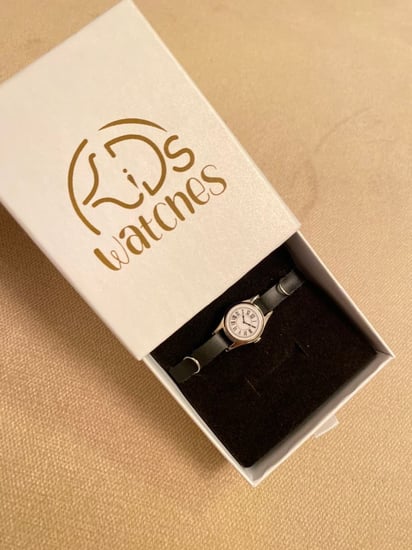 ساعة جلد مواليد