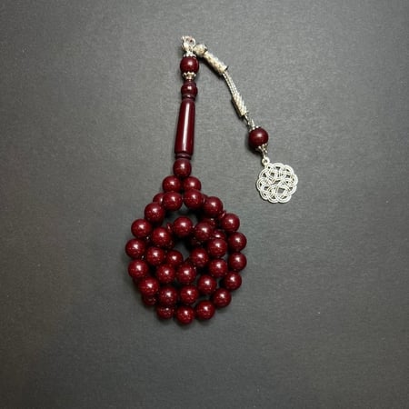 تسوق سبحة تراب كهرمان -بكلايت- شكة -  عنابي غامق مميز