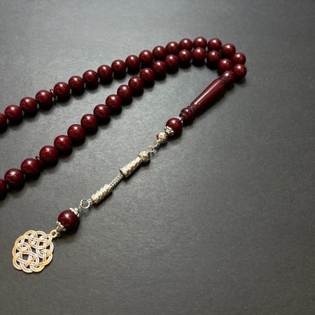 تسوق سبحة تراب كهرمان -بكلايت- شكة -  عنابي غامق مميز