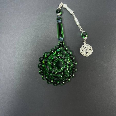 سبحة تراب كهرمان -بكلايت- شكة - زيتي شفاف مكحل بخيط اسود مميز