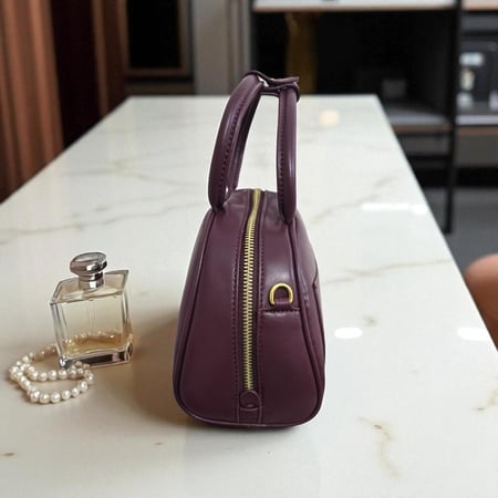 حقيبة ميو نصف دائري عنابي