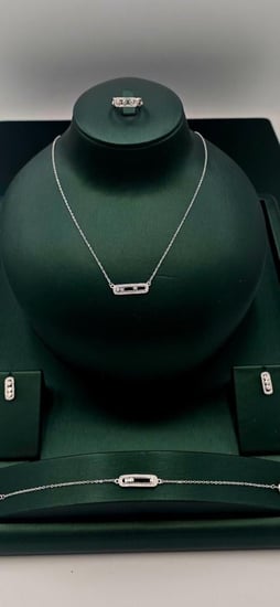 طقم فضه ٩٢٥ قلاده و  سوار و خاتم واقراط