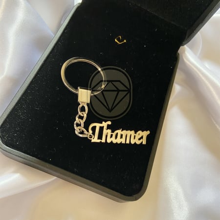 ميدالية مطليه بالفضة بالأسم حسب طلبك (MD00077)