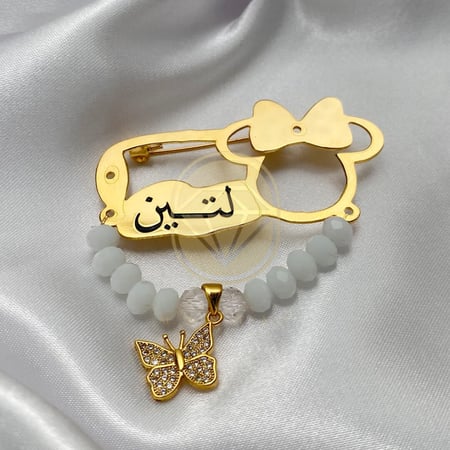 بروش مطلي بالذهب مع فصوص زركون بالأسم حسب طلبك