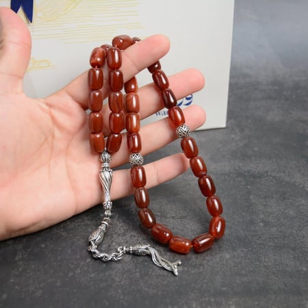 سبحة حجر العقيق شاهد فضة