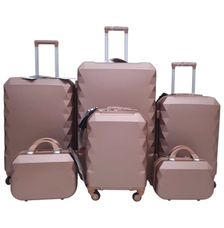 طقم حقائب سفر فايبر 6 قطع بجوانب مدببة لون روز قولد