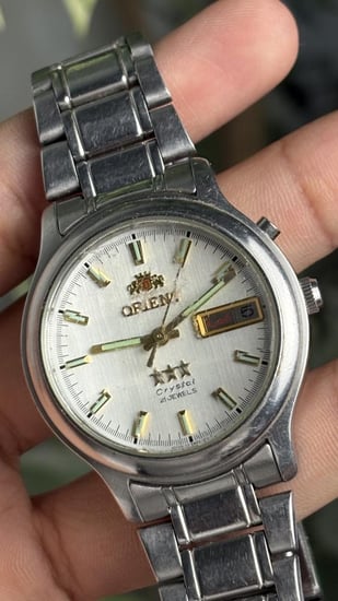 ساعة -أورينت