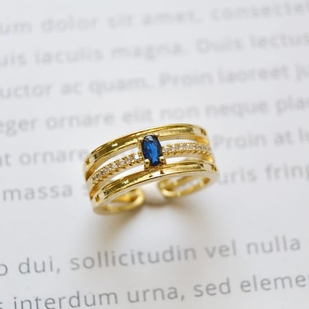 [R020] خاتم مطلي ذهب بحجر زفير أزرق بيضاوي