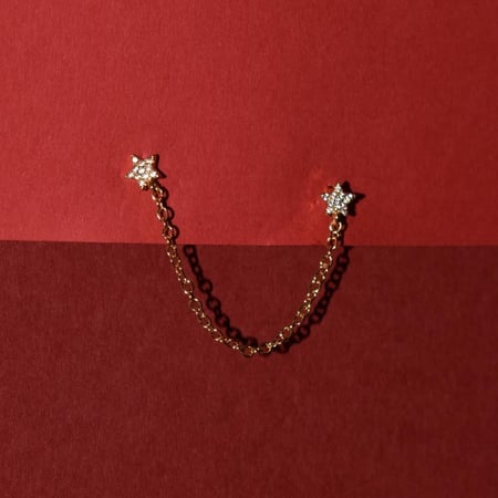 Tiny star earring