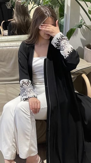 كلوش أسود مزين بشيفرون بارز الملمس