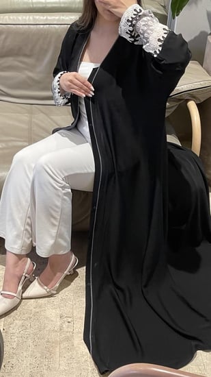 كلوش أسود مزين بشيفرون بارز الملمس