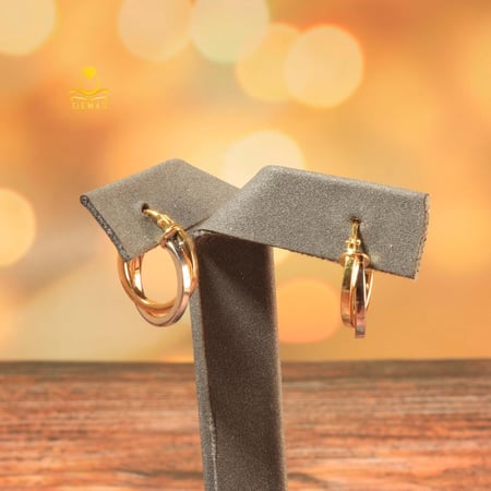 حلق ذهب تويستد لونين عيار 18