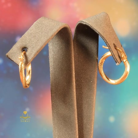 حلق تويستد ذهب صافي عيار 18