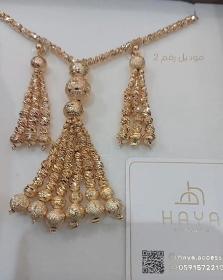 طقم فاخر كأطقم الذهب 100% (سلسال طويل + حلق)